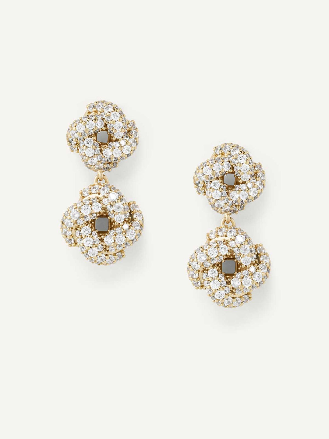 Pair of gold drop earrings with crystal-like stones