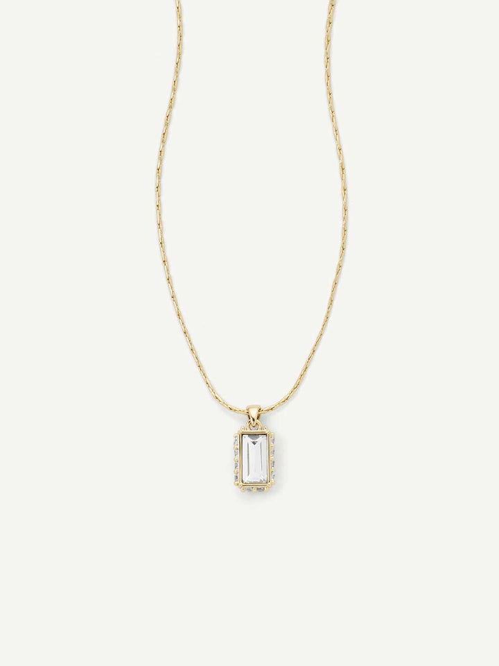 Gold necklace with a rectangular pendant on a white background